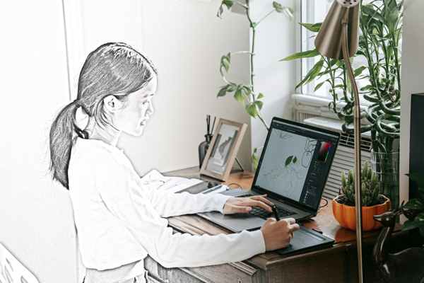 Student working at a laptop